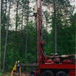 Tom Shepard (co-owner) setting up and drilling near Boulder Junction, WI.